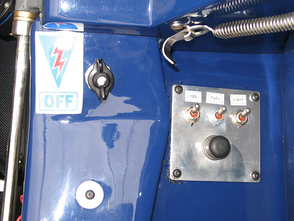 Lucas rotary battery disconnect switch. Ignition, fuel, and rain light toggle switches. Starter button.