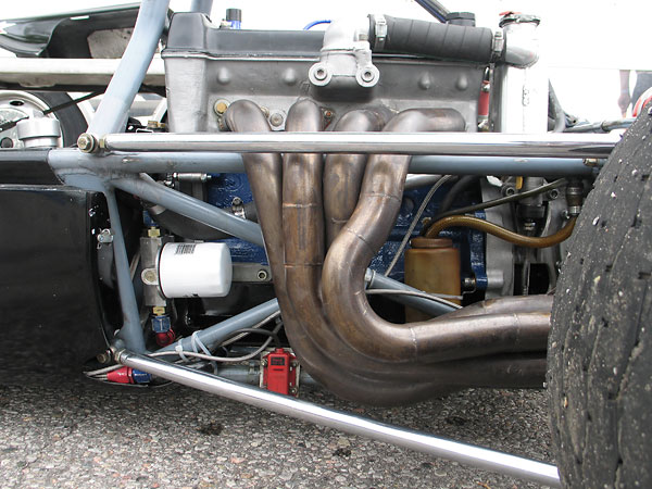 The original headers would almost certainly have been sand-bent out of mild steel tubing.