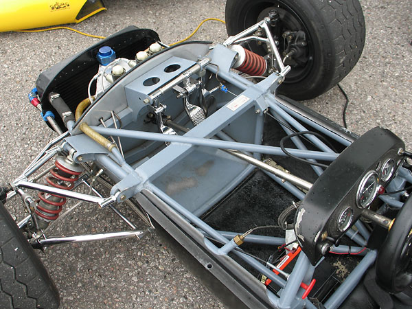 The two larger diameter, upper frame tubes carry engine coolant.