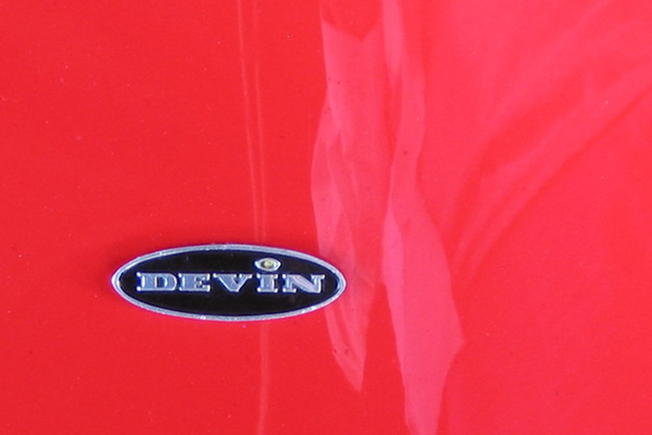 Devin Enterprises Inc. bonnet emblem.