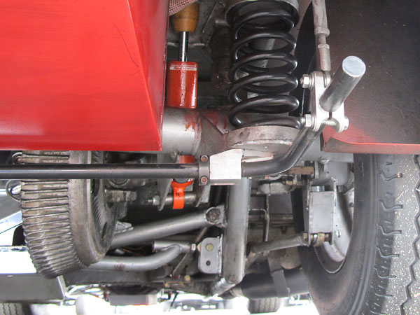 Like a solid (live) axle, a De Dion tube keeps wheels parallel to each other and perpindicular to the road.