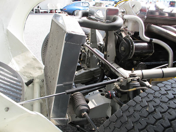 The custom aluminum radiator and matching header tank are two of very few modern components.