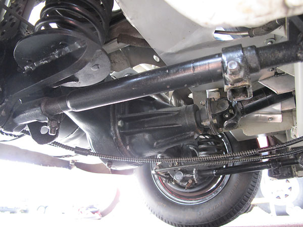 Hansgen installed coil springs and telescoping shocks where Jaguar had used leafsprings and lever shock absorbers