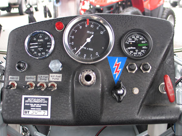 Toggle switches: rain light, ignition, low pressure fuel pump, and high pressure fuel pump.