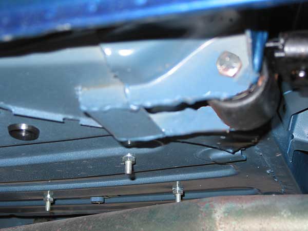 Reinforced (buttressed) leaf spring mounting