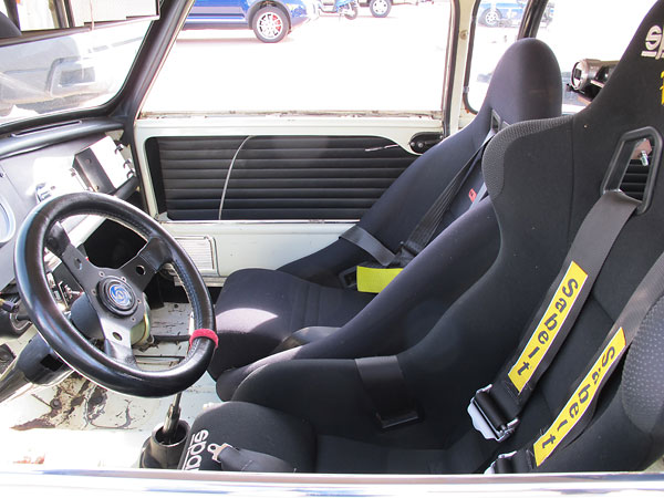 Sparco Evo drivers seat and Sabelt six point cam-lock safety harness. Cobra passenger seat.