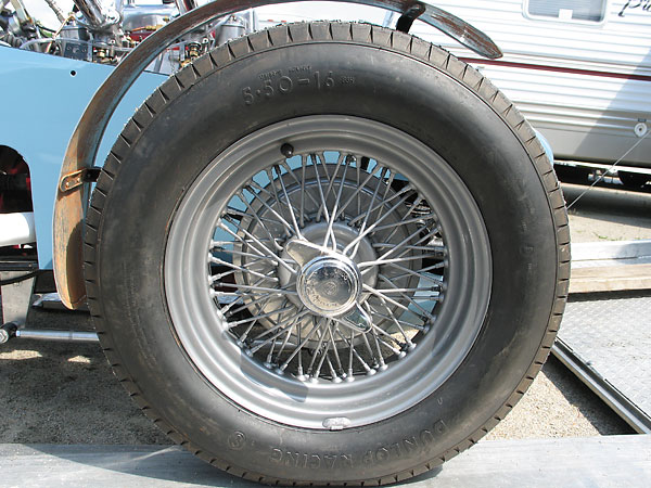 Dunlop Racing 5.50x16 tires on Dunlop sixty spoke sixteen inch wire wheels.
