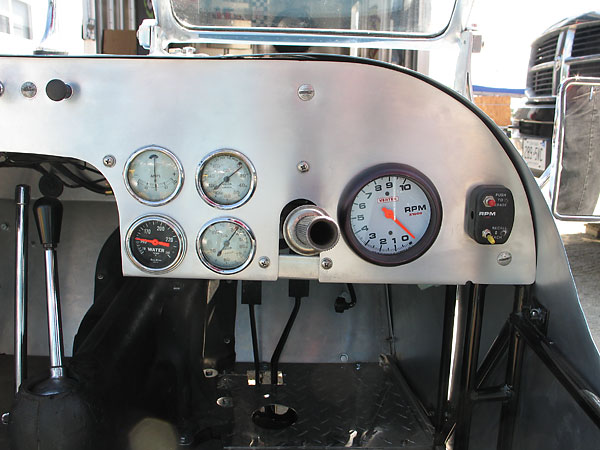 Jaeger oil pressure and temperature gauges, and Vertex tachometer