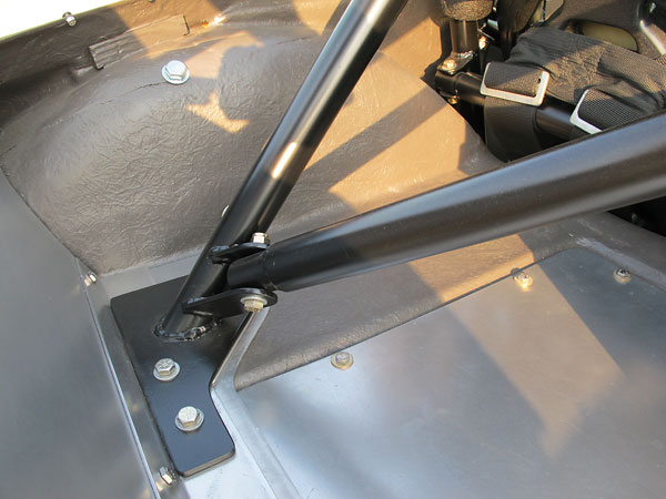 This is a bolt-in and modular rollcage. Bars can be temporarily removed for ease of service.