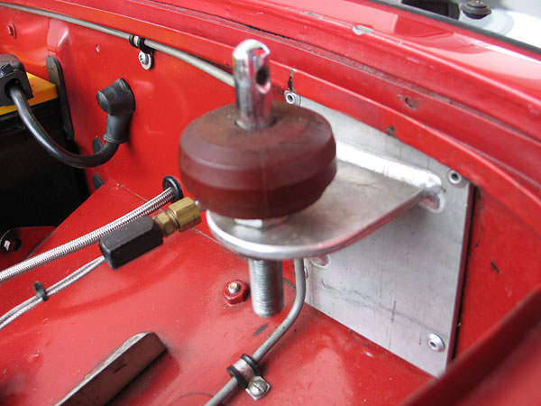 The bonnet is mounted on four hood pins, instead of being hinged.