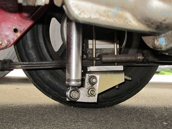 Carrera telescoping rear shock absorbers.