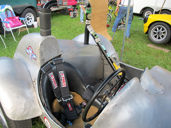 Mid-1970s vintage roll hoop to comply with then-current vintage racing safety requirements.