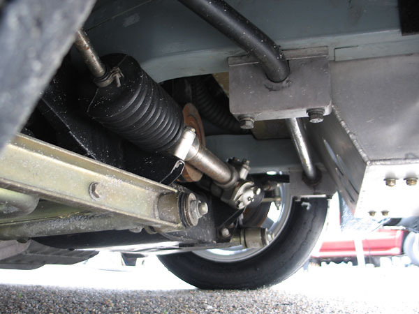 Adjustable anti-sway bar mounted on aluminum pillow blocks.