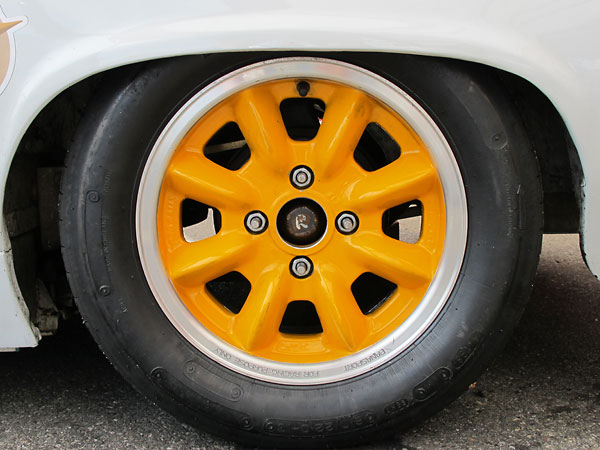 Panasport Racing 13x6 aluminum wheels.