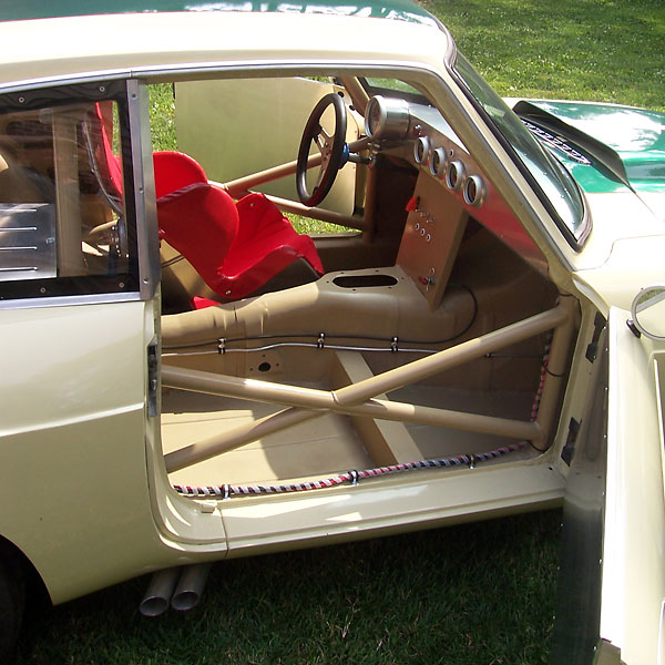 racecar interior, featuring custom aluminum racecar dashboard and Kirkey aluminum racing seat
