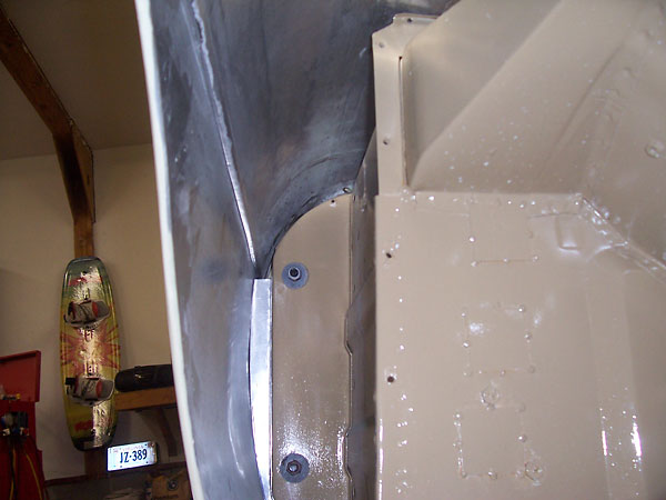 Inside of aluminum fender, looking rearward.