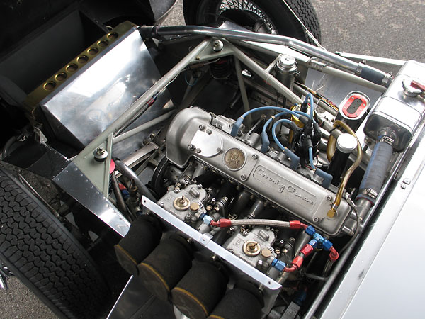 The Coventry Climax engine features aluminum block and cylinder head, and weighs about 250 pounds.