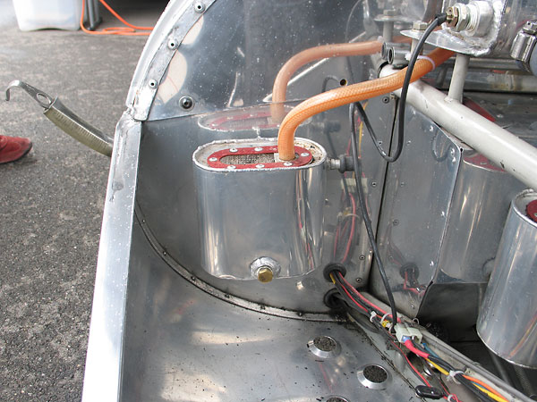 Separate aluminum breather/catch tanks for coolant and for the crankcase.
