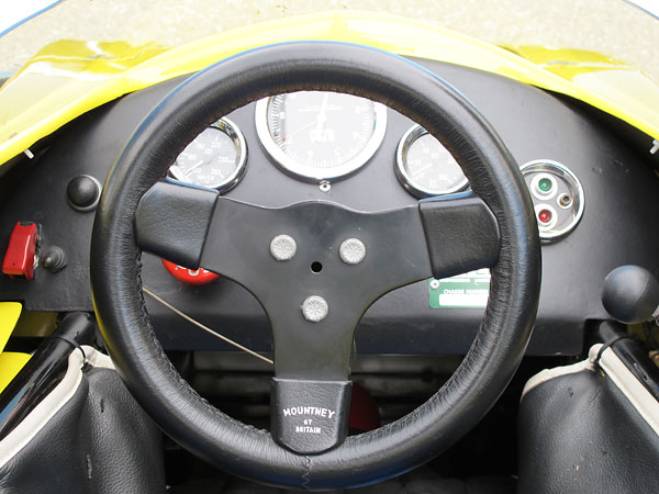 Mountney of Britain leather wrapped steering wheel.