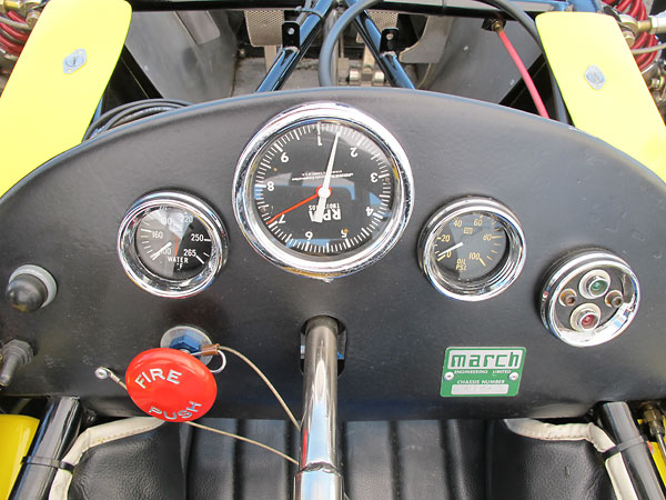 Stewart Warner water temperature and oil pressure gauges, and Jones mechanical tachometer.