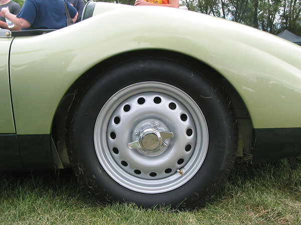 15x5.5 Dunlop peg-drive knock-off steel wheels. Dunlop bias-ply historic racing tires.