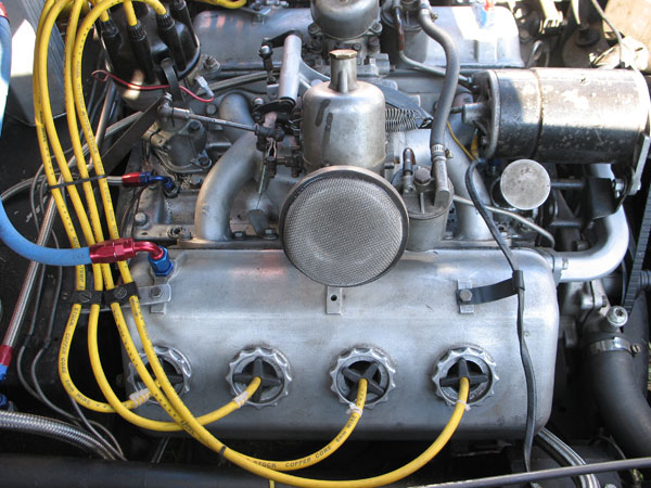 Stock dual HD6 (1.75 bore) S.U. carburetors with special modified jet needles.