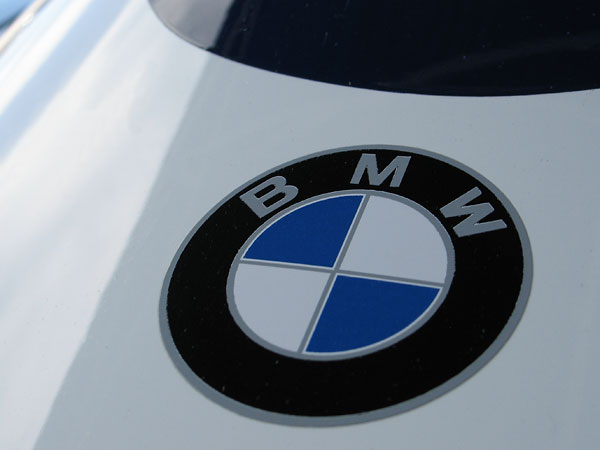 BMW decal, because this racecar is powered by a BMW M12/7 2.0L four-cylinder engine.