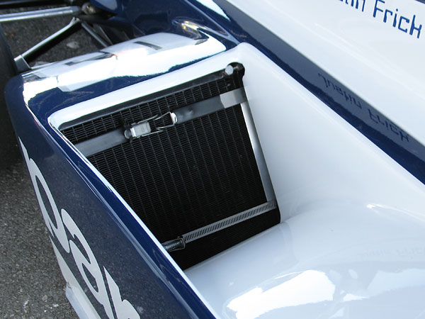 The March 822 features dual copper/brass radiators, mounted in its side pods.