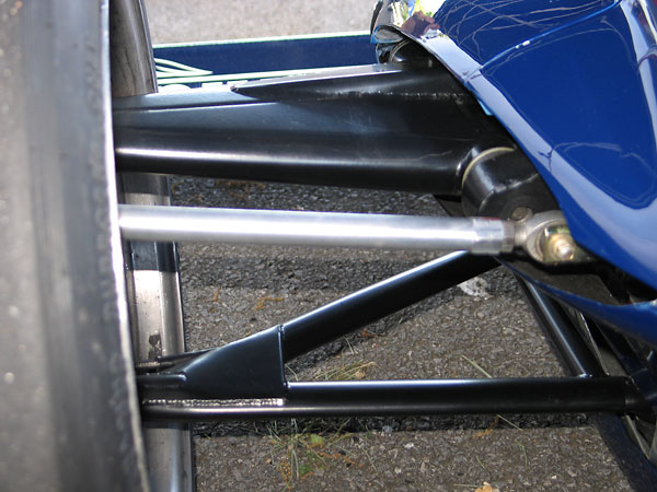 Cars that generate a lot of aerodynamic downforce at speed require stiffer suspension springs.