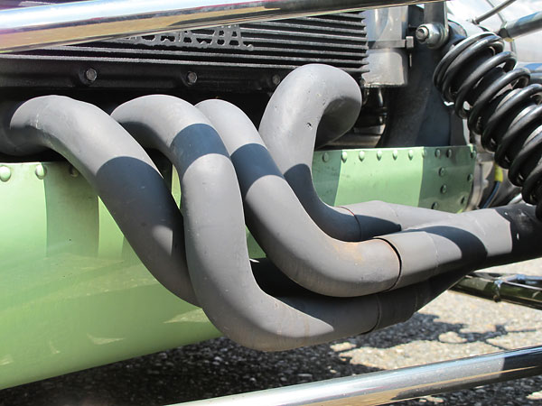 Hand-crafted, sand-bent, four-into-one exhaust headers.