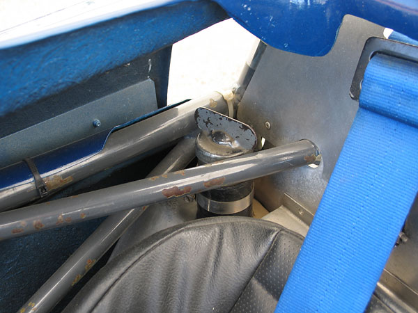 Wedge shaped under-seat fuel tank.