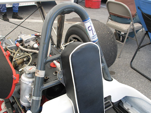 This appears to be the original roll hoop, but with a larger and more elaborate headrest.