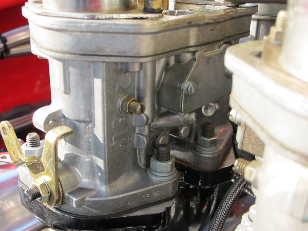 The base of each carburetor is stamped 44 IDF 81 which corresponds to Weber part number 18990.035.