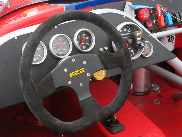 Behind the steering wheel: Tilton remote brake bias adjustment knob.