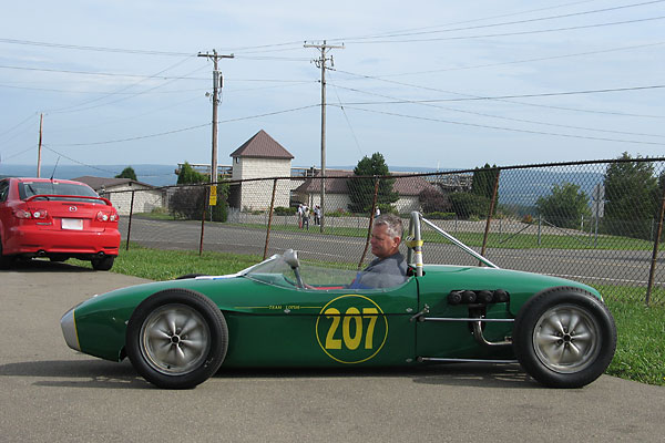 Marcus Jones drives Allen Fine's Lotus 18 Junior Race Car, Number 207