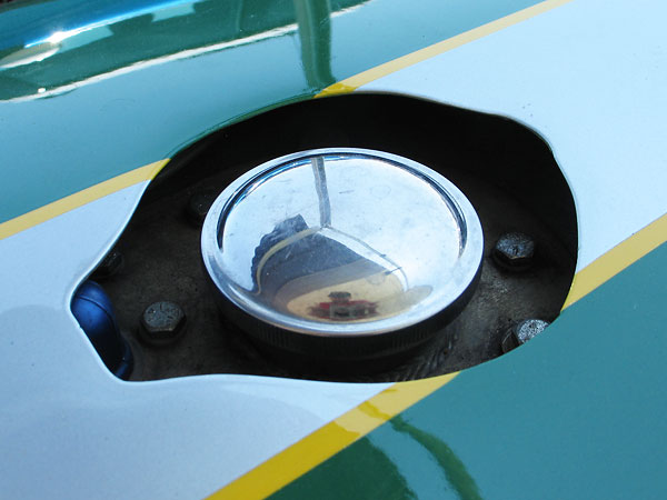 LeMans Style flip-open fuel cap would have been original.