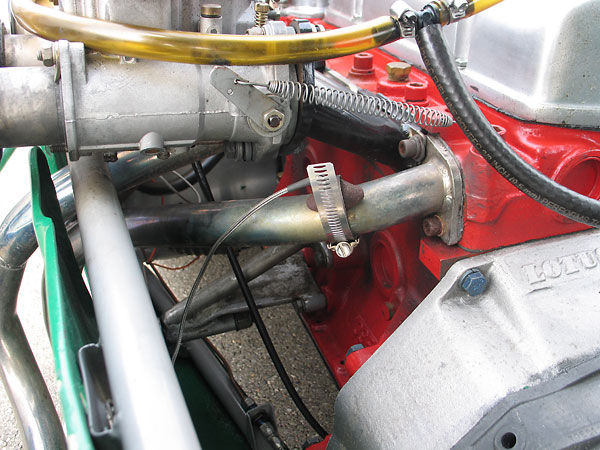 Exhaust gas temperature sensor, mounted to the exhaust header.