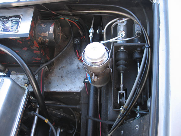 Single Girling remote-reservoir brake master cylinder.