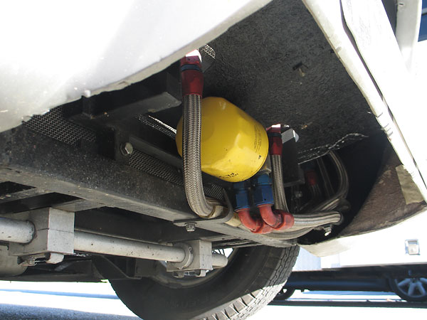 Remotely mounted (Pennzoil PZ-34) oil filter, and oil cooler connections.