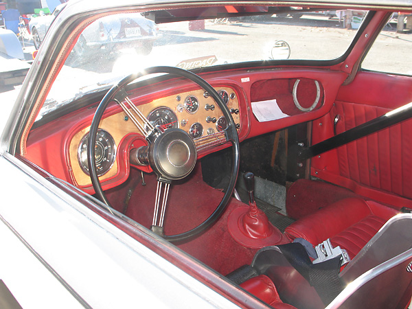 In the 1950's and early 60's it was sometimes considered unsporting to strip interior trim from a racecar.
