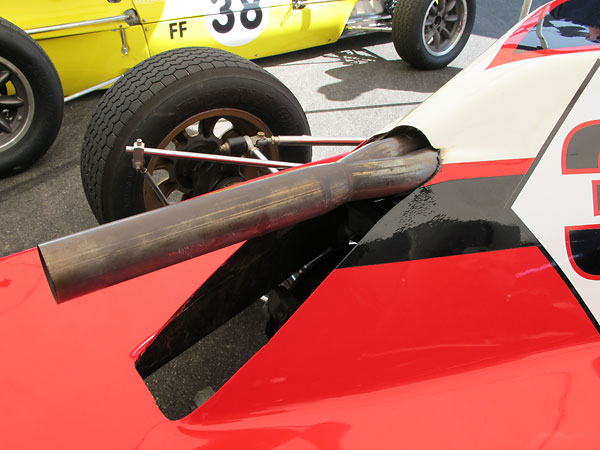 Normally the exhaust on a Crossle 35F comes through the bodywork on the lefthand side.