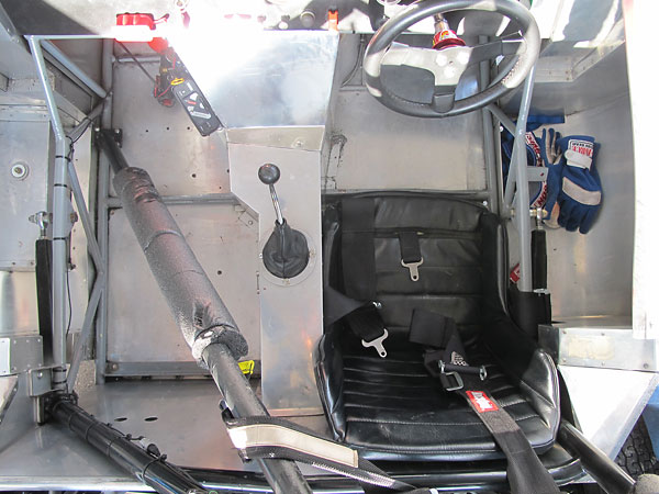 The driver's side footbox extends right up beside the engine.