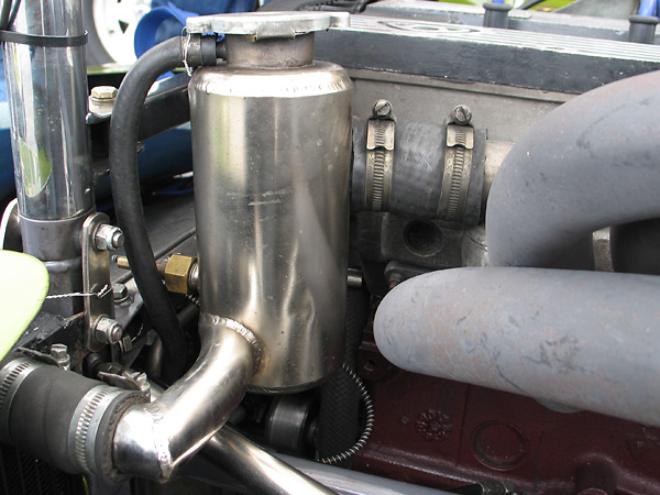 Stainless steel swirl pot helps deaerate the coolant.