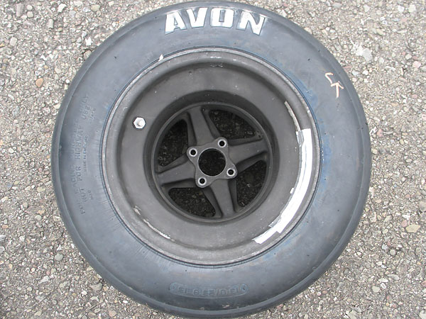 Avon 13 inch racing slicks (13x23 rear).