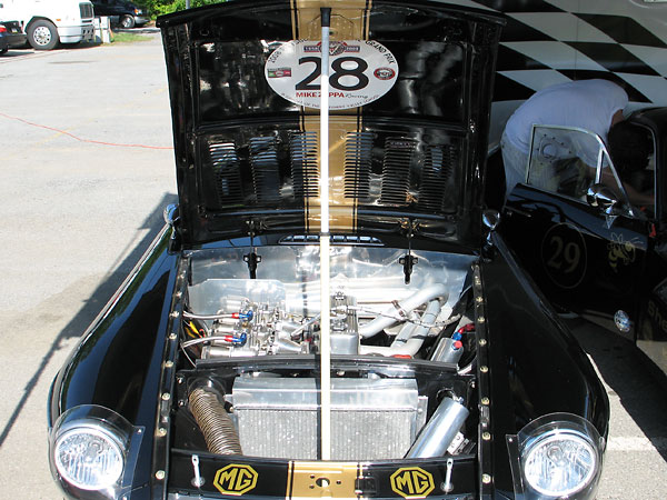 Until about 1969, MGB's came standard with lightweight aluminum hoods. This racecar still has one.