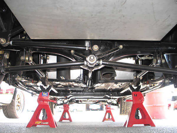 Custom four-link rear suspension, plus Watt's linkage.