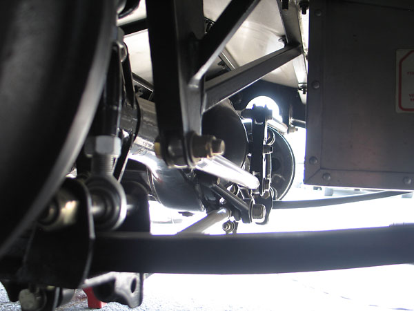 The Watt's linkage bellcrank pivot becomes the rear suspension roll center.