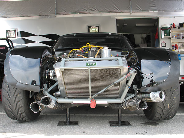 Ducts from the front clip's integral air dam supply airflow to the engine oil cooler and brakes respectively.