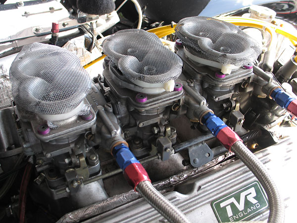 Triple Weber 44 DCNF carburetors.