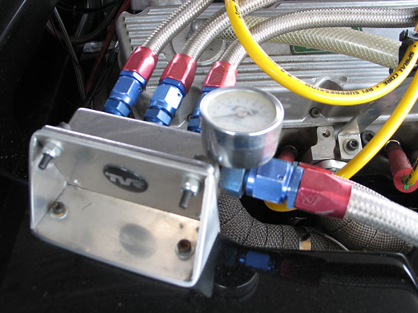 Mr. Gasket mechanical fuel pressure gauge (0-15psi), mounted to the Mr. Gasket triple outlet fuel block.